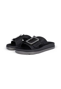 Black open-toe sandals featuring a woven strap design, a large metallic buckle, and a textured sole for enhanced grip and comfort.