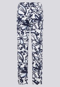 Floral-patterned trousers in white fabric with dark blue and light blue accents. Straight leg design, elastic waistband, and smooth texture.