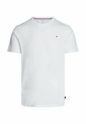 Witte T-shirt met korte mouwen en V-hals van katoen. Voorzien van een klein logo met een rood-blauwe streep op de linkerborst en een label aan de zoom.