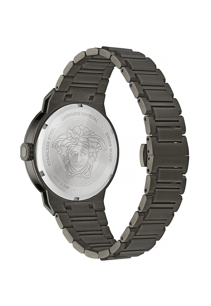 Orologio in acciaio inossidabile nero con cassa octagonale, cinturino testurizzato, vetro zaffiro e logo Medusa inciso sul retro. Made in Switzerland.