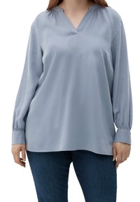 Helles blaues Langarmbluse mit V-Ausschnitt, dezent geraffenem Ausschnitt und elastischen Bündchen, aus glattem, leichtem Stoff gefertigt.