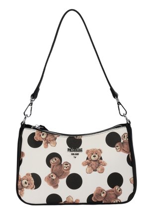 Piccola borsa a tracolla bianca con pois neri e motivi di orsetto marrone, tracolla nera e cerniera e fibbie argentate.