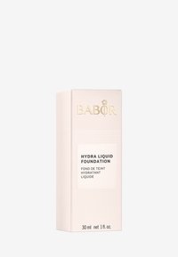 Babor Hydra Liquid Foundation-förpackning, ljusrosa med guldaccenter, inkluderar produktnamnet på en vit panel. Mått: 30 ml, 1 fl. oz.