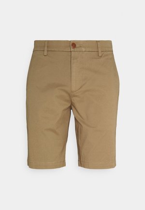 Khakishorts lavet af letvægtsstof med lige snit, bæltestropper, forreste knaplukning og syning langs kanten.