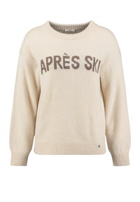 Jasno beżowy sweter z prążkowanym dołem i mankietami. Na przodzie wyhaftowane "APRÈS SKI" w ciemnym brązie. Miękka tekstura, luźny krój.