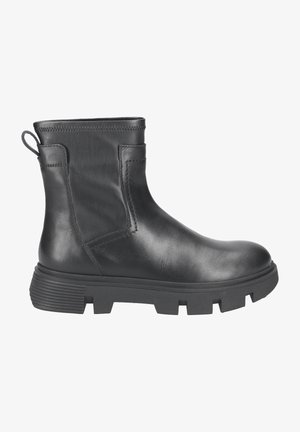 Schwarze Lederknöchelstiefel mit glatter Oberfläche, elastischem Seitenpanel und strukturiertem Gummisohle mit tiefen Profilen für besseren Halt.