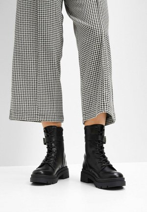 Stivaletti stringati - black