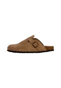 Beige suede clog with an adjustable strap and a cork sole. Smooth texture, round toe, and a lightweight design suitable for casual wear.