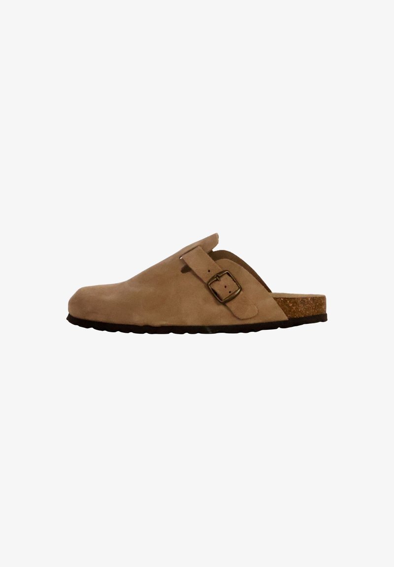 Beige suede clog with an adjustable strap and a cork sole. Smooth texture, round toe, and a lightweight design suitable for casual wear.
