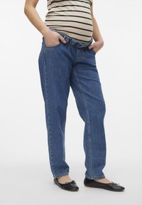 Denim gravidbyxor i avslappnad passform, med elastisk midja och framfickor; blå färg med en klassisk tvättad finish.