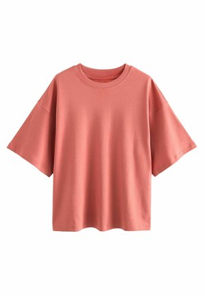 Overmaat t-shirt met korte mouwen in zachte koraalkleurige stof, ronde halslijn, gladde textuur, geen patronen of versieringen, losse pasvorm.