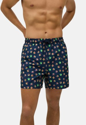 Bañador navy con un colorido patrón repetido de peces; cinturilla elástica con cordón; tejido ligero y transpirable.