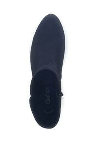 Women's black suede ankle boot with side zipper, rounded toe, and branded insole, shown from a top-down view on white background.