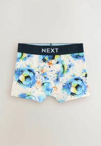 Killeboxershorts med ett mönster av blå och gröna fotbollar på en krämfärgad bakgrund. Har ett marinblått elastiskt midjeband med "NEXT"-logotyp.