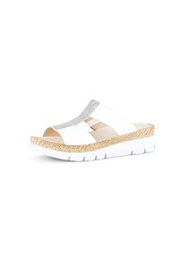 White slide sandal with silver accents, a woven texture on the sole, and a contoured shape for comfort. Open toe and side cutouts visible.