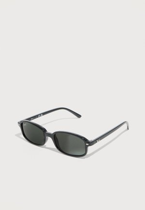 Black rectangular sunglasses with dark lenses and thin arms, resting on a plain light surface.