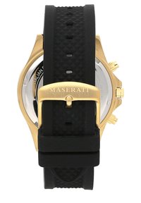 Maserati-horloge met een gouden kast, zwarte rubberen band en een getextureerde afwerking. Voorzien van een gesp met 'MASERATI'-gravure.