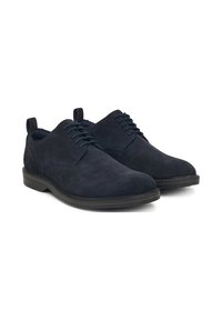 Scarpe oxford in suede navy con una texture liscia, punta rotonda e suola in gomma nera. Presentano chiusura con lacci e linguetta sul tallone.