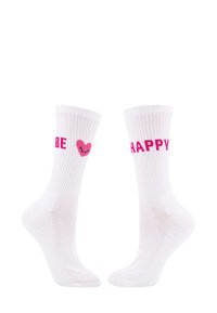 Białe bawełniane skarpetki z prążkowaną teksturą i różowym napisem. Jedna skarpetka mówi "BĄDŹ" z różowym sercem, a druga "SZCZĘŚLIWY".