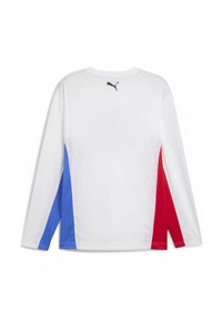 Langærmet skjorte i hvid med blå og røde sidelapper. Har Puma-logo i sort på bagsiden. Letvægts, atletisk design.