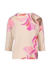 Beige three-quarter sleeve blouse featuring large pink and coral floral patterns. Soft fabric with ribbed cuffs and neckline detail.