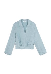 Lyseblå cropped bluse lavet af tekstureret stof, med V-hals, lange puffærmer og en rynket talje detalje.
