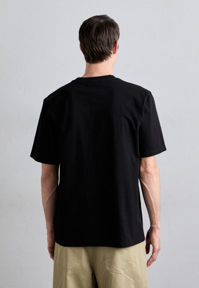 Black cotton t-shirt with a crew neckline and short sleeves, displaying a relaxed fit. Back view shows smooth fabric without patterns.