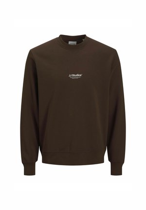 Brown sweatshirt made from soft fabric with a crew neckline, long sleeves, and subtle white “JJ Studios” branding on the front.