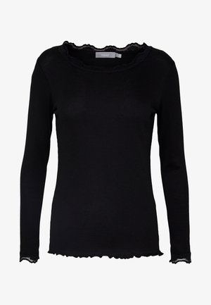 Top nero a maniche lunghe realizzato in tessuto a coste, con scollatura in pizzo ondulato e polsini rifiniti con orlo ondulato.