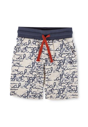 Kinder-Shorts mit marineblauem elastischem Bund, rotem Kordelzug und weißem Stoff mit abstraktem marineblauem Schriftmuster.