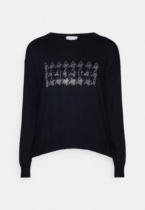 Maglione nero lavorato a maglia con una vestibilità comoda, caratterizzato da un motivo houndstooth metallico sul petto e polsini e orlo a coste.