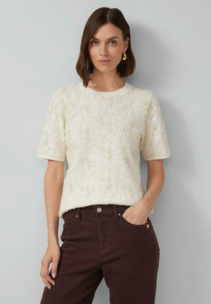 T-shirt con stampa - creme