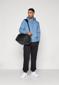 Champion ICONS CUFF PANTS - Jogginghose - black
