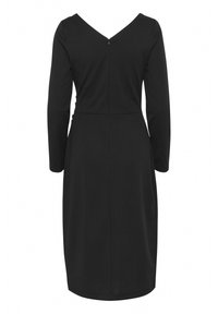Vestido negro de manga larga con escote en V en la parte de la espalda y cremallera oculta. Textura suave con una silueta ajustada, diseño hasta la rodilla.