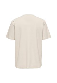 T-shirt beige uni côtelé à manches courtes, vu de dos, avec un col rond et une coupe ample.