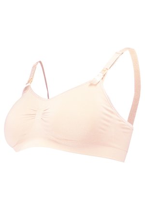 Bra wireless rosa chiaro con una texture liscia, dettaglio centrale arricciato, spalline regolabili e una ampia fascia elastica per il supporto.