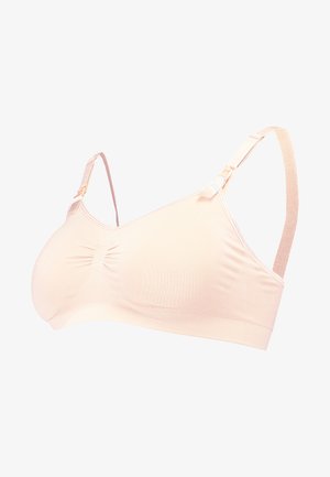 Bra wireless rosa chiaro con una texture liscia, dettaglio centrale arricciato, spalline regolabili e una ampia fascia elastica per il supporto.