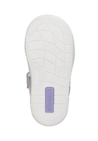 Semelle de chaussure blanche en caoutchouc avec un motif texturé, présentant une accent lavande étiquetée "BUNNIES.JR" près du talon.