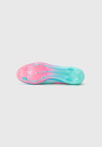 Brightly colored cleat outsole in pink and turquoise, featuring a textured pattern, molded studs, and distinct wave design.