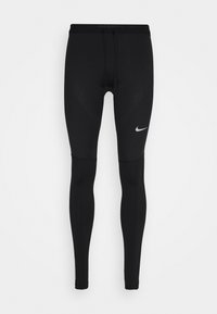 Leggings da corsa neri realizzati in un materiale elasticizzato, con un design testurizzato, vita elasticizzata e un piccolo logo bianco sulla parte anteriore.