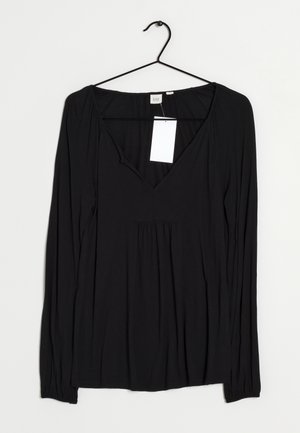 Top lungo nero a maniche lunghe con scollatura a V profonda, realizzato in un tessuto morbido. Presenta un dettaglio arricciato sotto la scollatura e un orlo dritto. Etichetta attaccata.