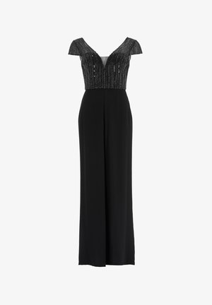 Une combinaison noire avec un décolleté en V profond, un corsage perlée et des manches courtes transparentes, conçue avec une silhouette à jambes larges.