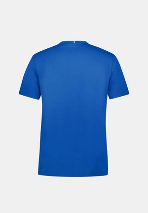 T-shirt bleu royal à manches courtes, fabriqué en coton doux, avec un col rond et un design minimaliste sans motifs ni accents supplémentaires.