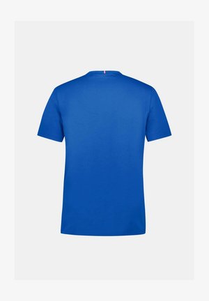 T-shirt bleu royal à manches courtes, fabriqué en coton doux, avec un col rond et un design minimaliste sans motifs ni accents supplémentaires.