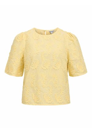 Blouse jaune à manches courtes avec broderie florale et col rond, dotée de manches bouffantes et d'une fermeture à boutons au dos.