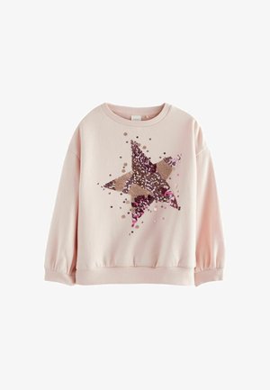 Sweatshirt rose pâle à manches longues avec poignets et ourlet côtelés, présentant un grand motif d'étoile multicolore en sequins sur le devant.