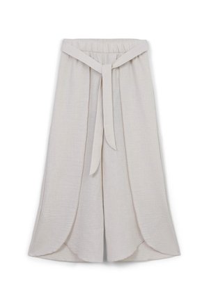 Helle beigefarbene Culottes mit weitem Bein-Design, ausgestattet mit einem elastischen Taillenbund und einem gebundenen Gürtel. Der Stoff hat eine strukturierte, weiche Oberfläche.