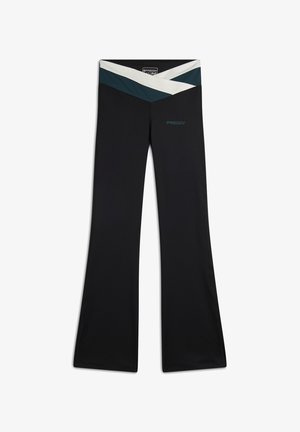 Pantaloni neri a zampa d'elefante con una vita alta caratterizzata da un motivo a zigzag in tonalità turchese e bianco. Realizzati in un tessuto elastico e leggero.