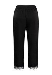 Black satin pants with an elastic waistband and lace trim at the hem, shown from the back against a white background.