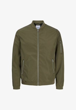 Odav roheka oliivirohelise tooniga bomberjakk, millel on esitelje lukk, kaks küljetaskut ja lukuga käetasku. Omab soonikkoes mansette ja vöökoda. Sile tekstuur.